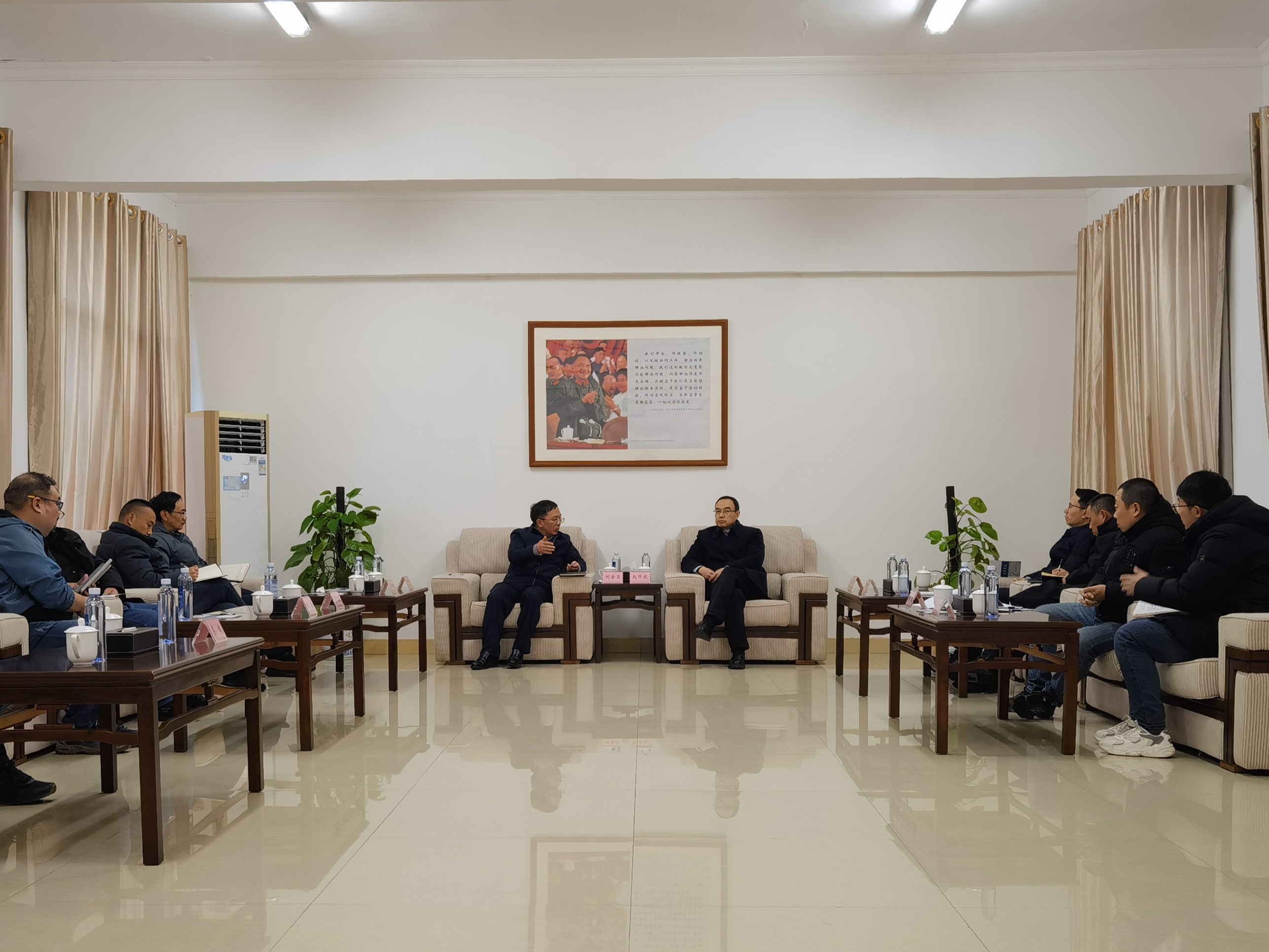 劉金榮與廣安市委常委、組織部長羅永平交流座談并調研小平干部學院改擴建工程項目